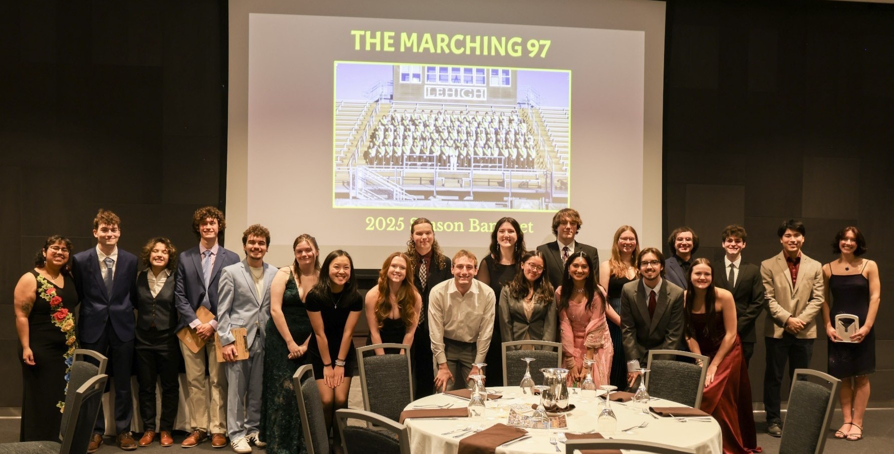 The new and old Executive Board smiling together at the band banquet